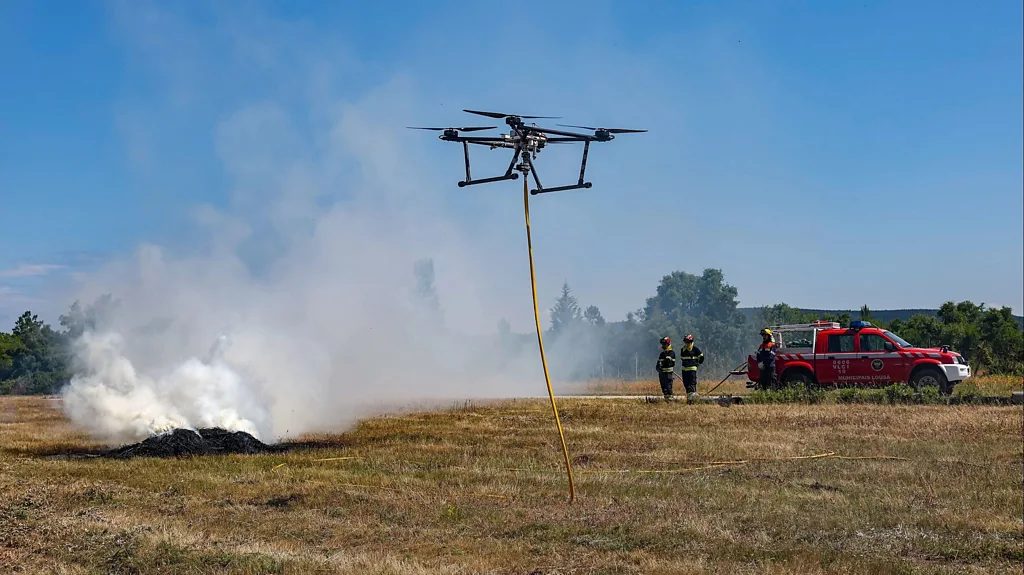 Ported nozzle system fire-fighting UAV